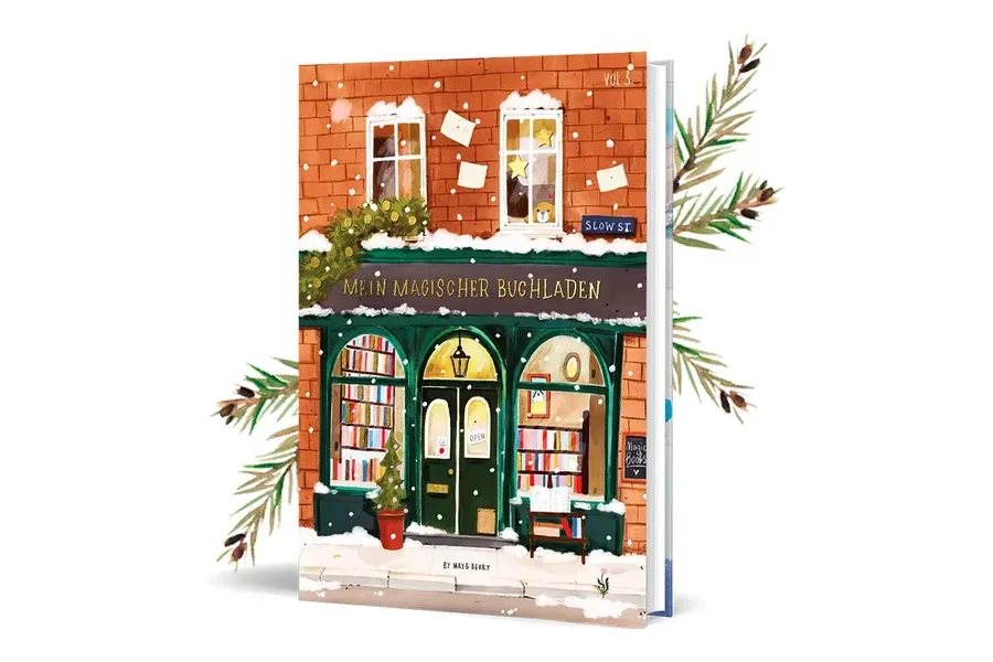 Hardcover-Malbuch Mein magischer Buchladen Vol. 3 von May and Berry mit Buchladen-Fassade im Schnee