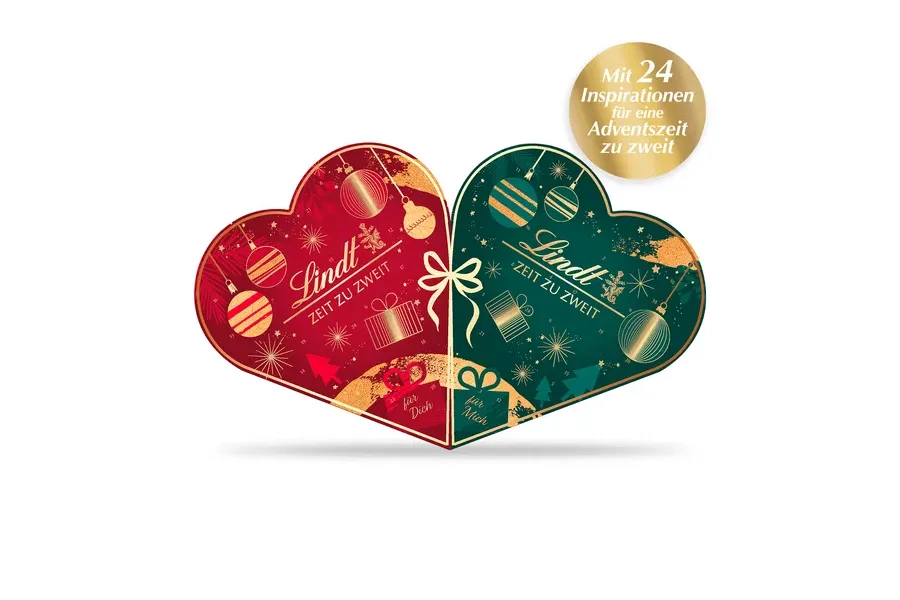 Lindt Adventskalender für Zwei in Herzform mit roter und grüner Hälfte