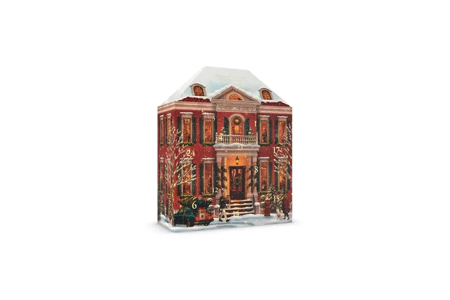 Rituals Classic Adventskalender 2026 als rotes Stadthaus mit 24 nummerierten Fenstern